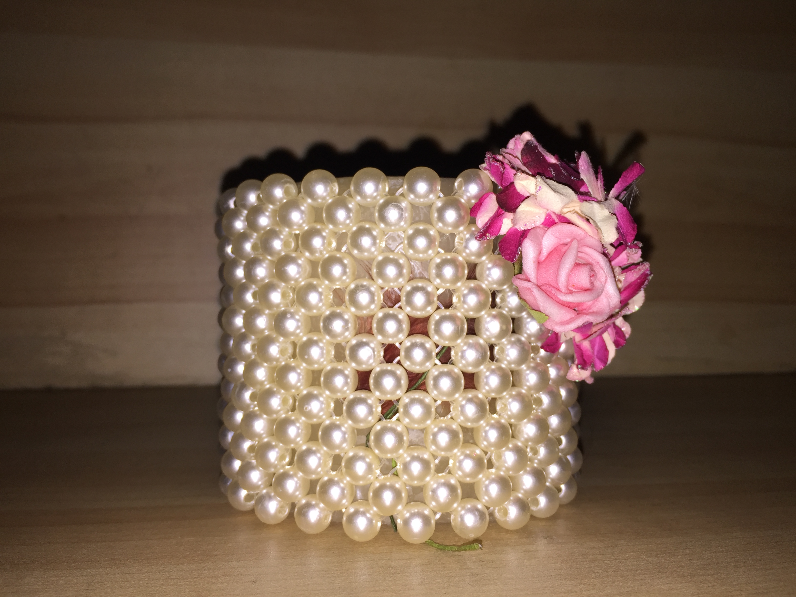 Flame  Candle with surrounded pearls 